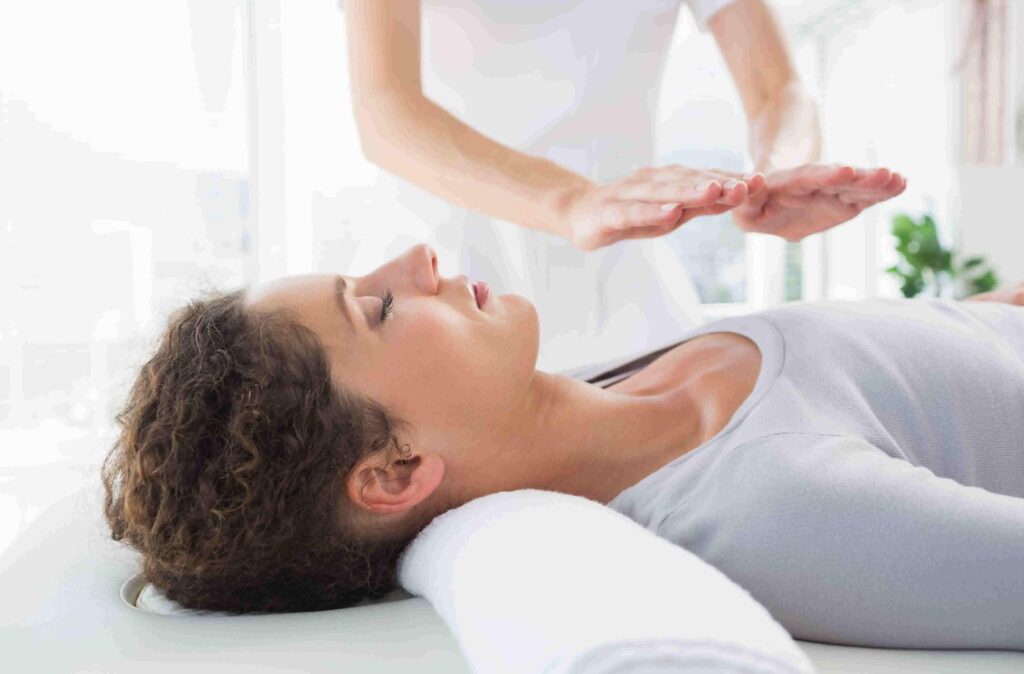 Energy healing therapy in a calming spa environment